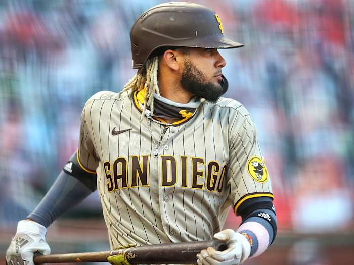 Fernando Tatis Jr. holds his bat